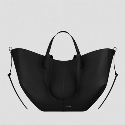 Patricia | Designet handleveske med sidefrynser