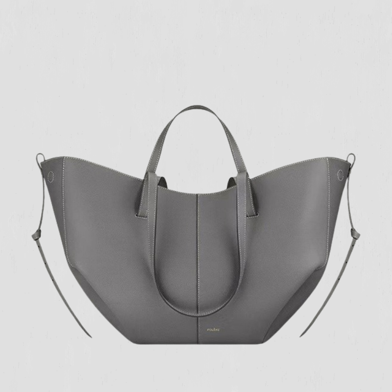 Patricia | Designet handleveske med sidefrynser