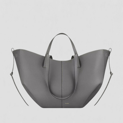 Patricia | Designet handleveske med sidefrynser