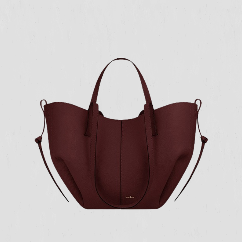 Patricia | Designet handleveske med sidefrynser