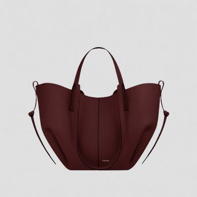Patricia | Designet handleveske med sidefrynser