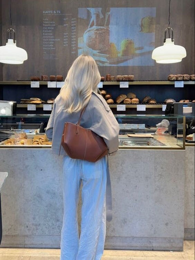 Patricia | Designet handleveske med sidefrynser
