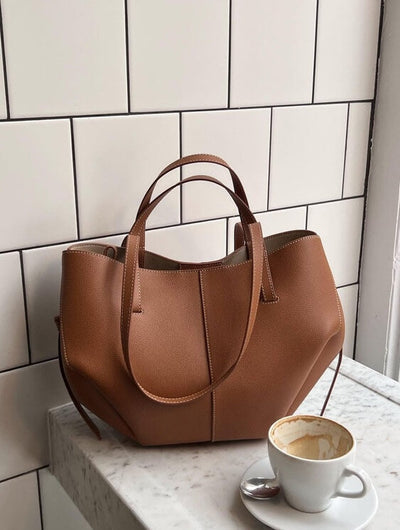 Patricia | Designet handleveske med sidefrynser