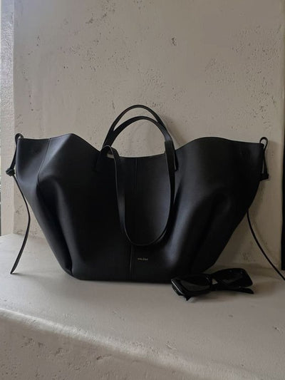 Patricia | Designet handleveske med sidefrynser