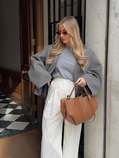 Patricia | Designet handleveske med sidefrynser